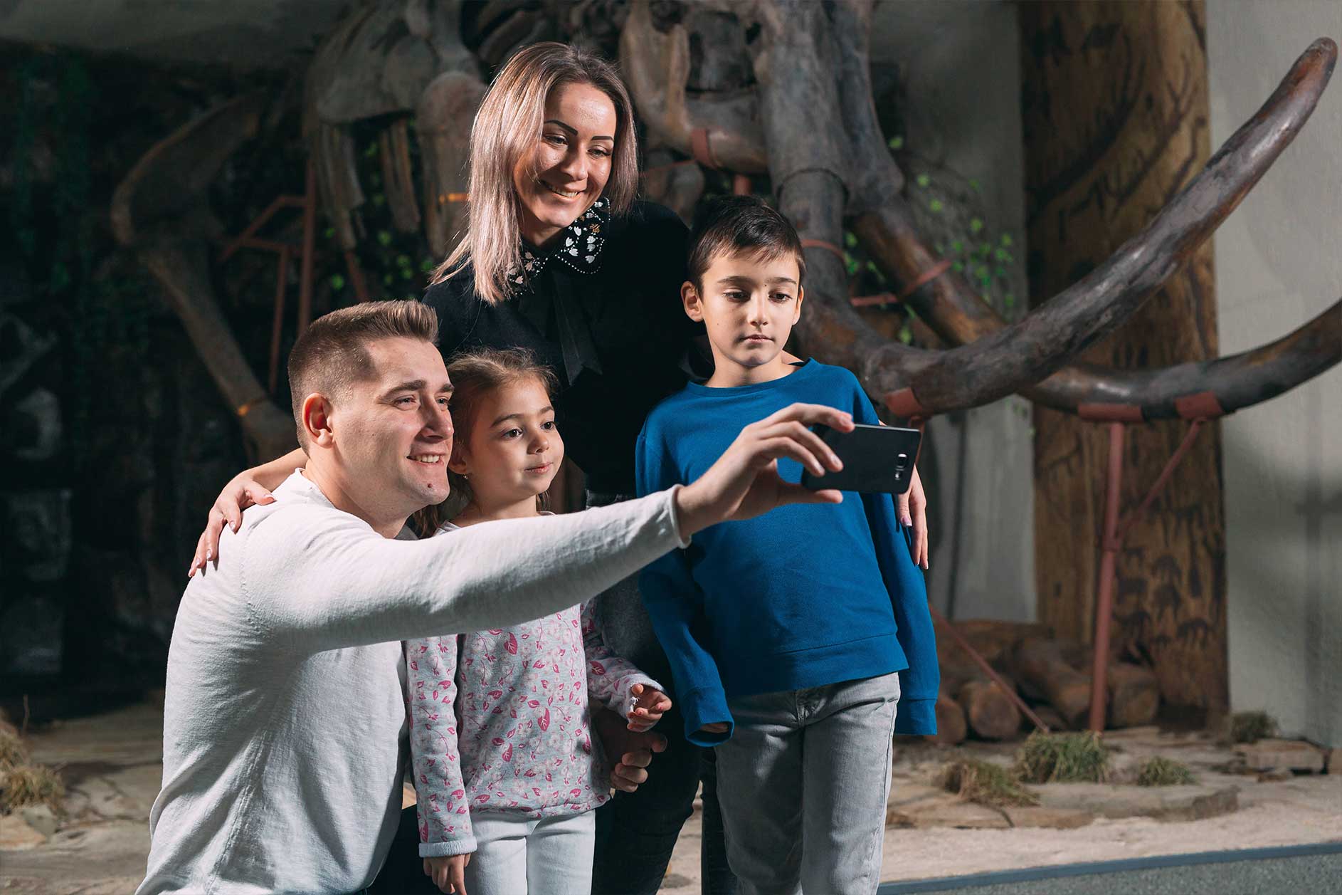 A family taking pictures together.